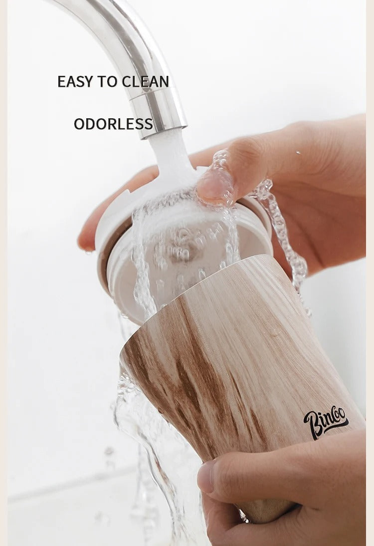 Hue and  Dunes Singapore travel coffee mug being washed, the best coffee mug for commuting with easy clean features
